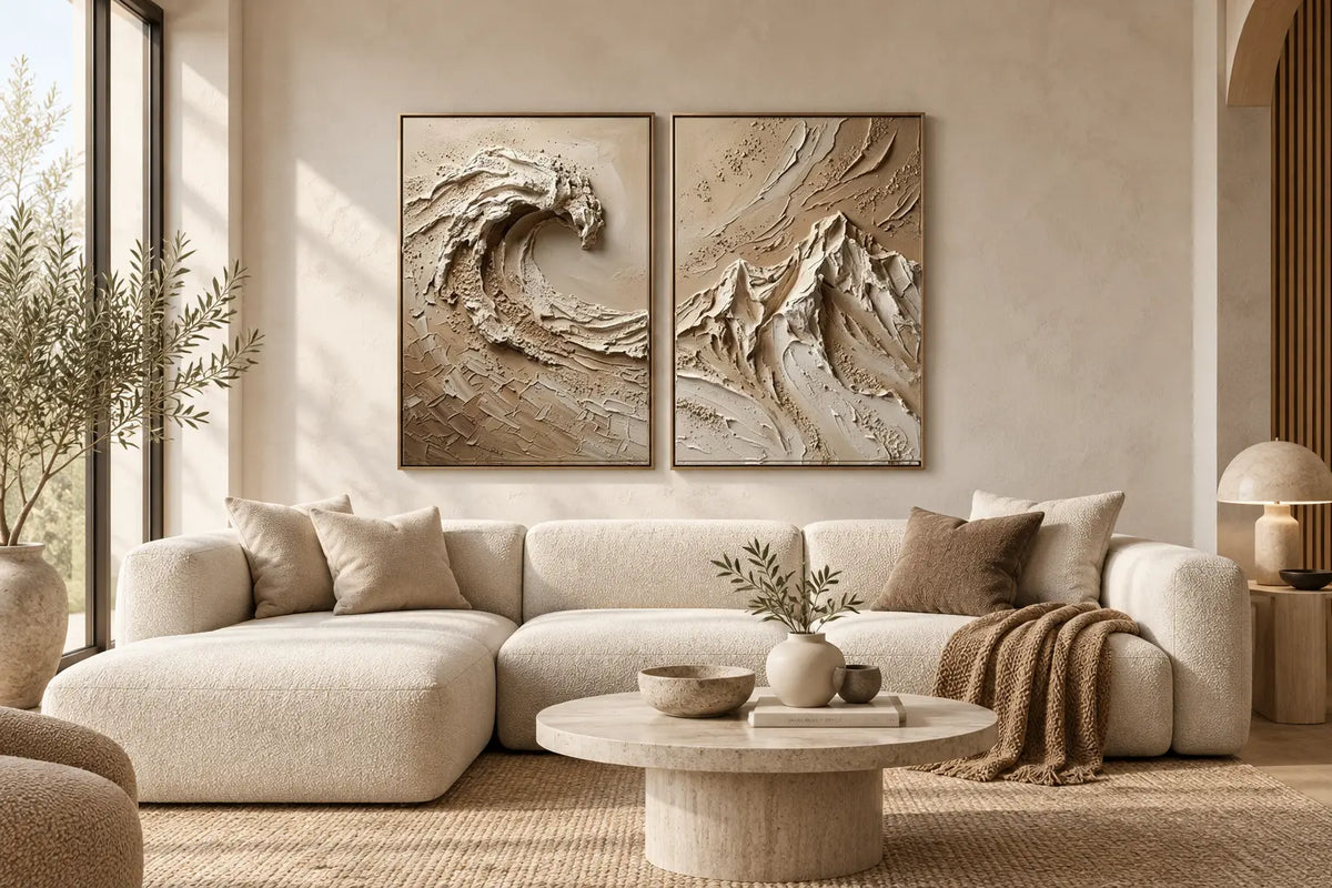 Neutral textured diptych wall art correctly aligned above a cream sofa